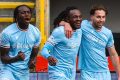ABERDEEEN, SCOTLAND - SEPTEMBER 20: Motherwell's Regan Charles-Cook (centre) celebrates with Emmanuel Longelo (L) and Lukas Fadinger after scoring to make it 1-0 during a Premier Sports Cup Quarter-Final match between Aberdeen and Motherwell at Pittodrie Stadium , on September 20, 2025, in Aberdeen, Scotland. (Photo by Craig Foy / SNS Group)