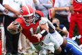 No. 12 Georgia bounces back from first loss of the season to beat Kentucky 35-14