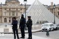 Thieves steal jewels of 'incalculable' value in seven-minute heist at Louvre museum in Paris