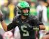 QB Dante Moore opts against NFL draft, returning to Oregon