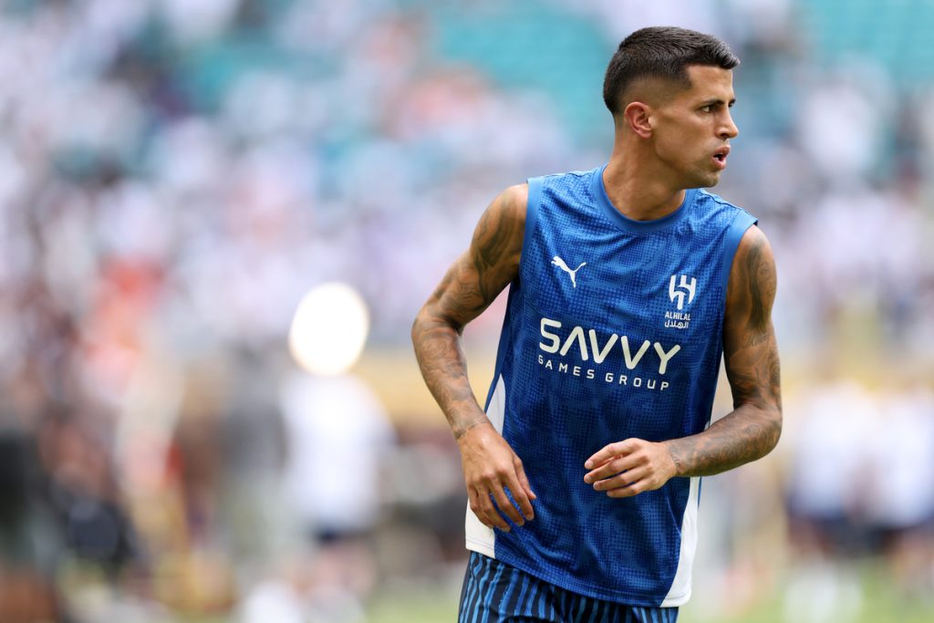 MIAMI GARDENS, FLORIDA - JUNE 18: Joao Cancelo #20 of Al Hilal warms up prior to the FIFA Club World Cup 2025 group H match between Real Madrid CF and Al Hilal at Hard Rock Stadium on June 18, 2025 in Miami Gardens, Florida. (Photo by Megan Briggs/Getty Images) (Inter links)
