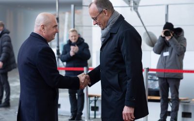 Invitație adresată cancelarului Merz de Bolojan pentru întâlnire la București