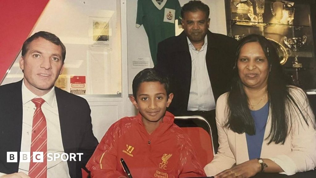 Vimal Yoganathan alongside Brendan Rodgers when he signed for the academy at Liverpool