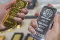 Silver, gold sell off as precious metals markets nosedive