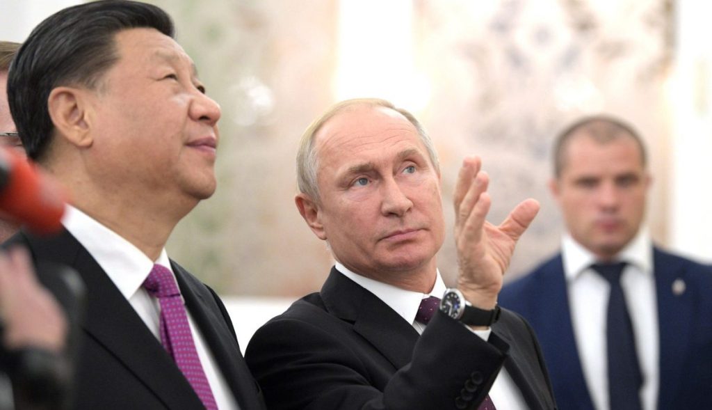 Vladimir_Putin_and_Xi_Jinping_2019-06-05_31-e1642503550894.jpg