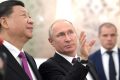 Vladimir_Putin_and_Xi_Jinping_2019-06-05_31-e1642503550894.jpg