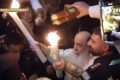 Sfânta Lumină a ajuns la București: Flacăra de la Ierusalim, în România