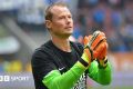 Alex Manninger claps his hands