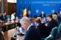 Bolojan, optimist: Guvernul va lucra mai ieftin cu mai puțini miniștri