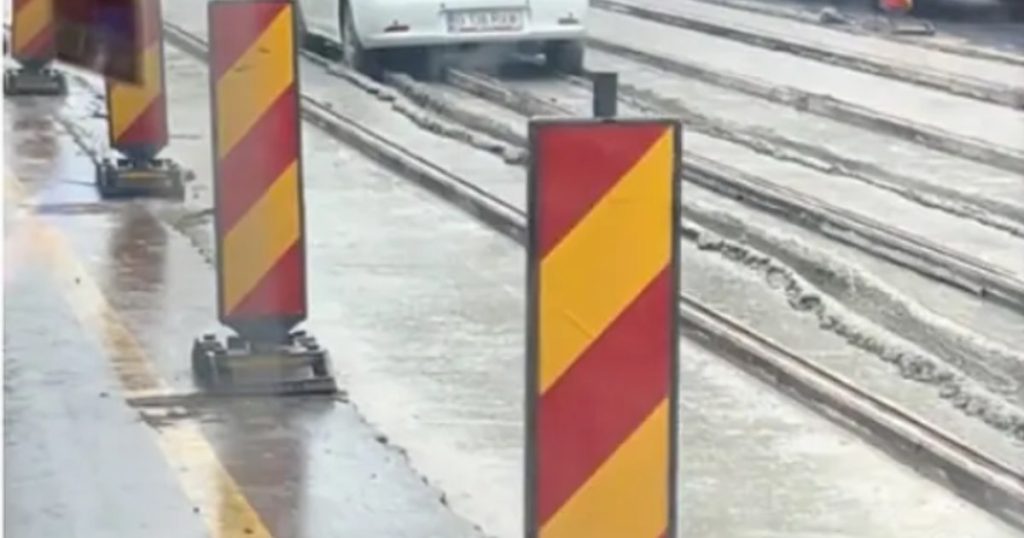 Logan blocat în betonul proaspăt, șoferul încurcat (foto virale)